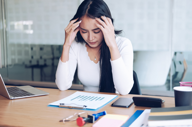 businesswoman feeling tired, frustrated stressed from hard work.